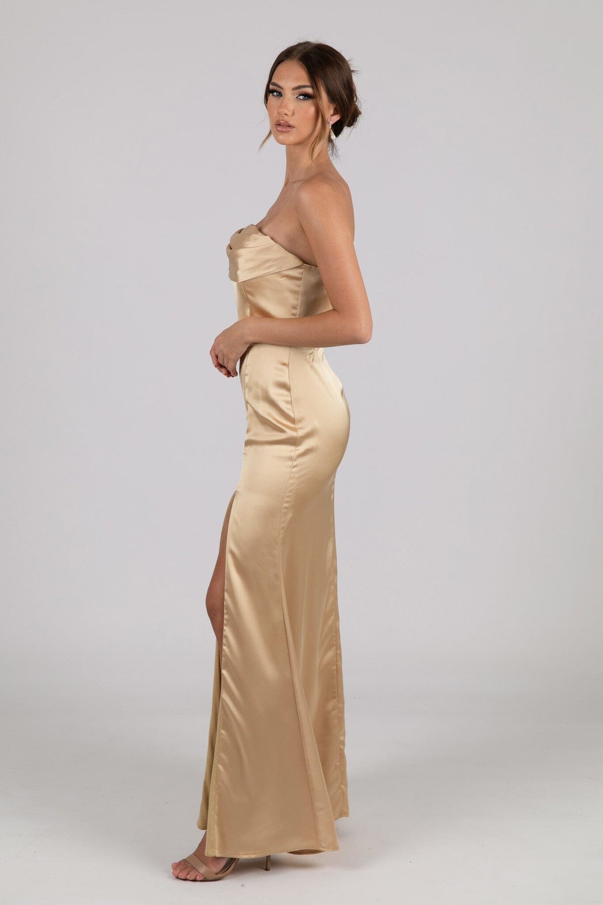 Side Image of Neutral Gold Champagne Coloured Strapless Satin Maxi Dress with Draped Detail at Bust and Side Slit