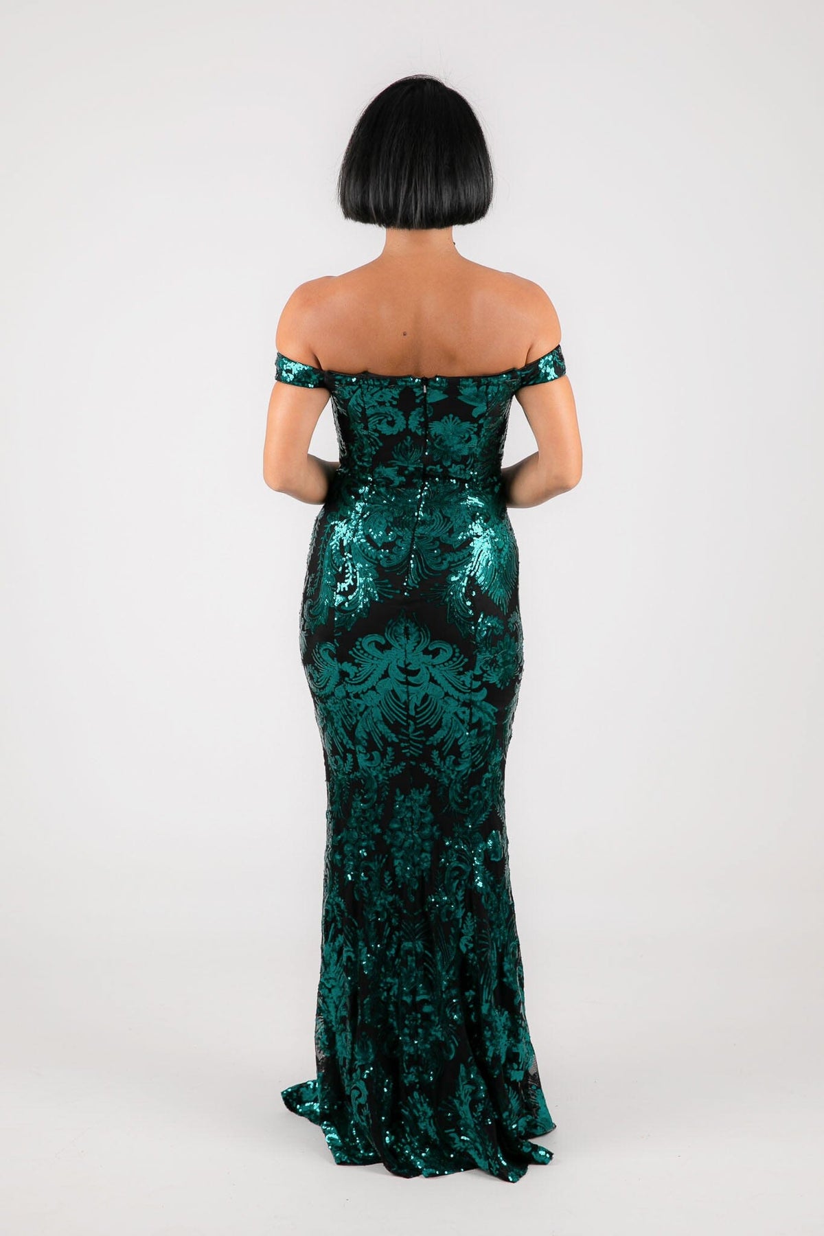 Open Shoulder Design of Emerald Green Sequins with Black Underlay Off Shoulder Full Length Maxi Dress with V Cut Out Neckline Detail and Slit on the Left Leg