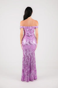 Back Image of Open Bare Shoulder Design of Purple Lilac Sequins Off Shoulder Full Length Maxi Dress with V Cut Out Neckline Detail and Slit on the Left Leg