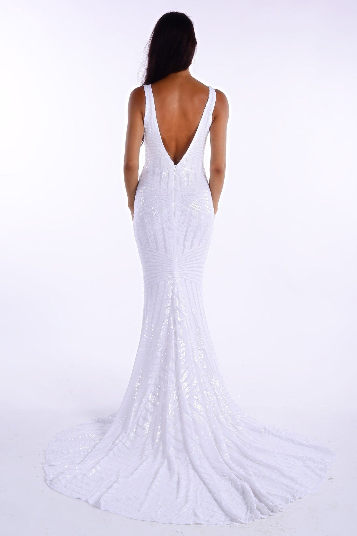 Backless Design of White geometric sequin sleeveless evening gown featuring sweetheart neckline, shoulder straps, V open back and a very long train