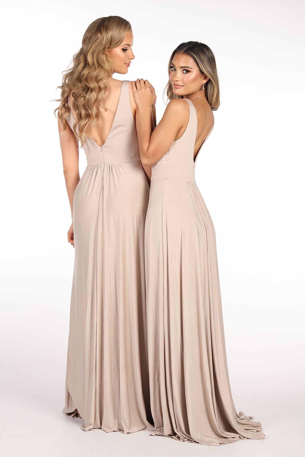 Low V-Back Design and Invisible Back Zip Closure of Nude Coloured Flowy Floor-Length Bridesmaid Dress featuring fitted V-Neckline Bodice, A-Line Skirt and Thigh-High Front Split