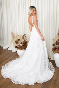 Side and Back Image of White Floral Lace A-line Wedding Gown with V Neckline, Open Back and Thigh High Side Split