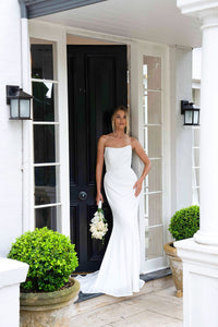 White Minimalist Satin Bridal Gown with Strapless Scoop Neckline, Gathered Detail and Sweep Train