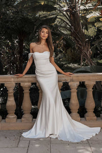 Ivory white off the shoulder fitted wedding dress with draped detail and sweep train