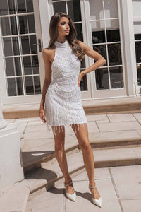 White pearl and sequin embellished mini dress with high halter neckline and beaded fringe hem