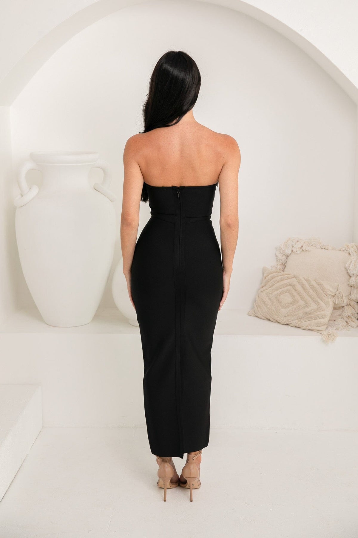 Back Image showcasing open shoulders of Black Strapless Bandage Maxi Dress with Clear Stones Embellished around the strapless sweetheart neckline