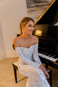 Nude Illusion Fitted Wedding Dress with Off-Shoulder Long Sleeves in White Pattern Sequin and Nude Underlay