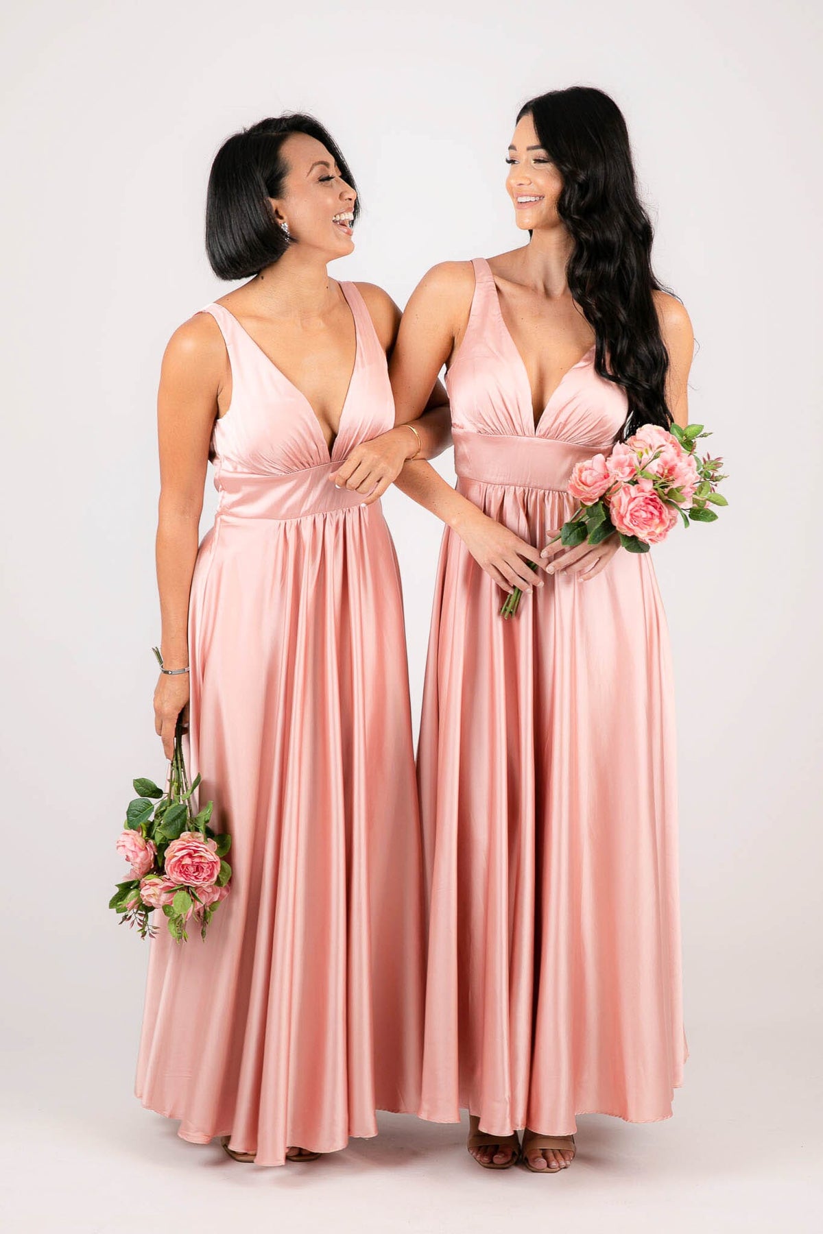 Bridesmaids wearing Light Pink Satin A-line Maxi Dress with V Neckline, Gathered Detail and V Open Back