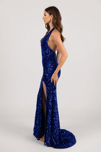 Low Cut Side Image of Royal Blue Velvet Sequin Fitted Evening Gown with Halter Neck and Side Slit
