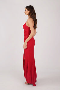 Side Image of Red Shimmer Fitted Maxi Dress with Thin Shoulder Straps, Gathered Detail at Waist and Leg Slit