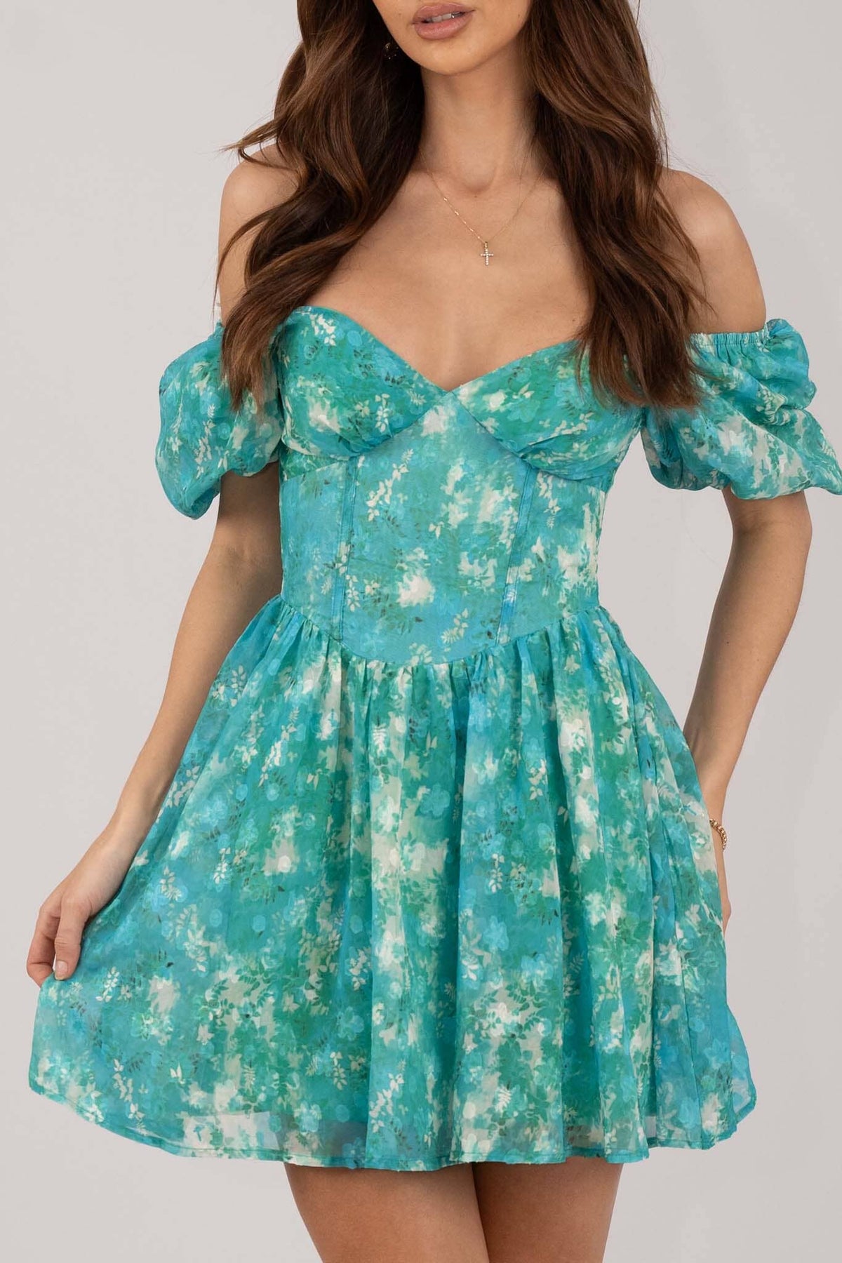 Close Up Image of Green Floral Mini Dress with Sweetheart Neckline and Off The Shoulder Puff Sleeves