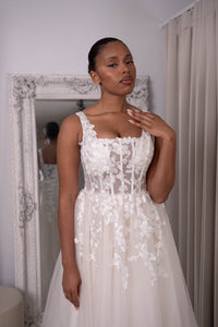 Close Up Image of Ivory Off-White Square Neck A-line Lace Wedding Gown with Floral Lace Motifs Embellishment