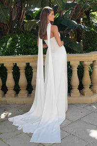 NIKITA strapless satin wedding gown in ivory with elegant waist draping, thigh-high leg slit and flowing train, paired with JULIA satin bridal scarf