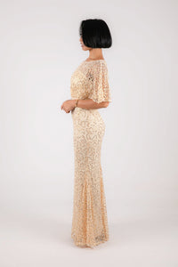 Side Image of Beige and gold sequin evening maxi dress with boat neckline and butterfly sheer half sleeves
