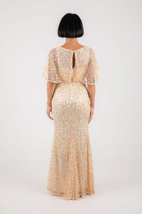 Back Image of Beige and gold sequin evening maxi dress with boat neckline and butterfly sheer half sleeves