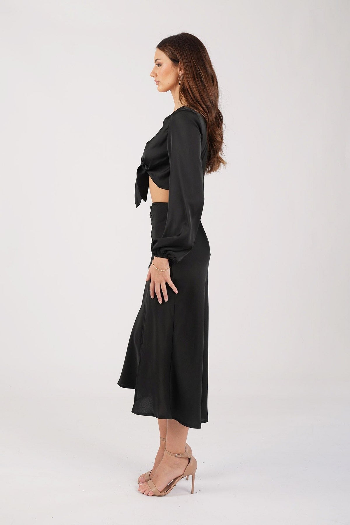 Side Image of Satin Two-Piece Set including Long Sleeve V Neck Front Tie Crop Top and Midi Skirt with Split in Black