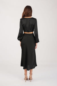 Back Image of Satin Two-Piece Set including Long Sleeve V Neck Front Tie Crop Top and Midi Skirt with Split in Black