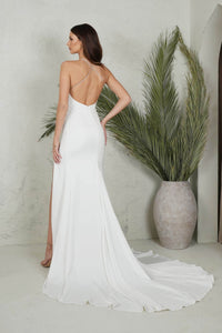Back Image of Ivory White Silky Satin Floor Length Fitted Gown with V Neckline, Thin Spaghetti Straps, Thigh High Side Slit and Crisscross Open Back