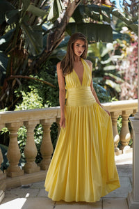 SIENNA lemon yellow halter neck maxi dress featuring a plunging neckline, flattering ruched waist and flowing skirt.