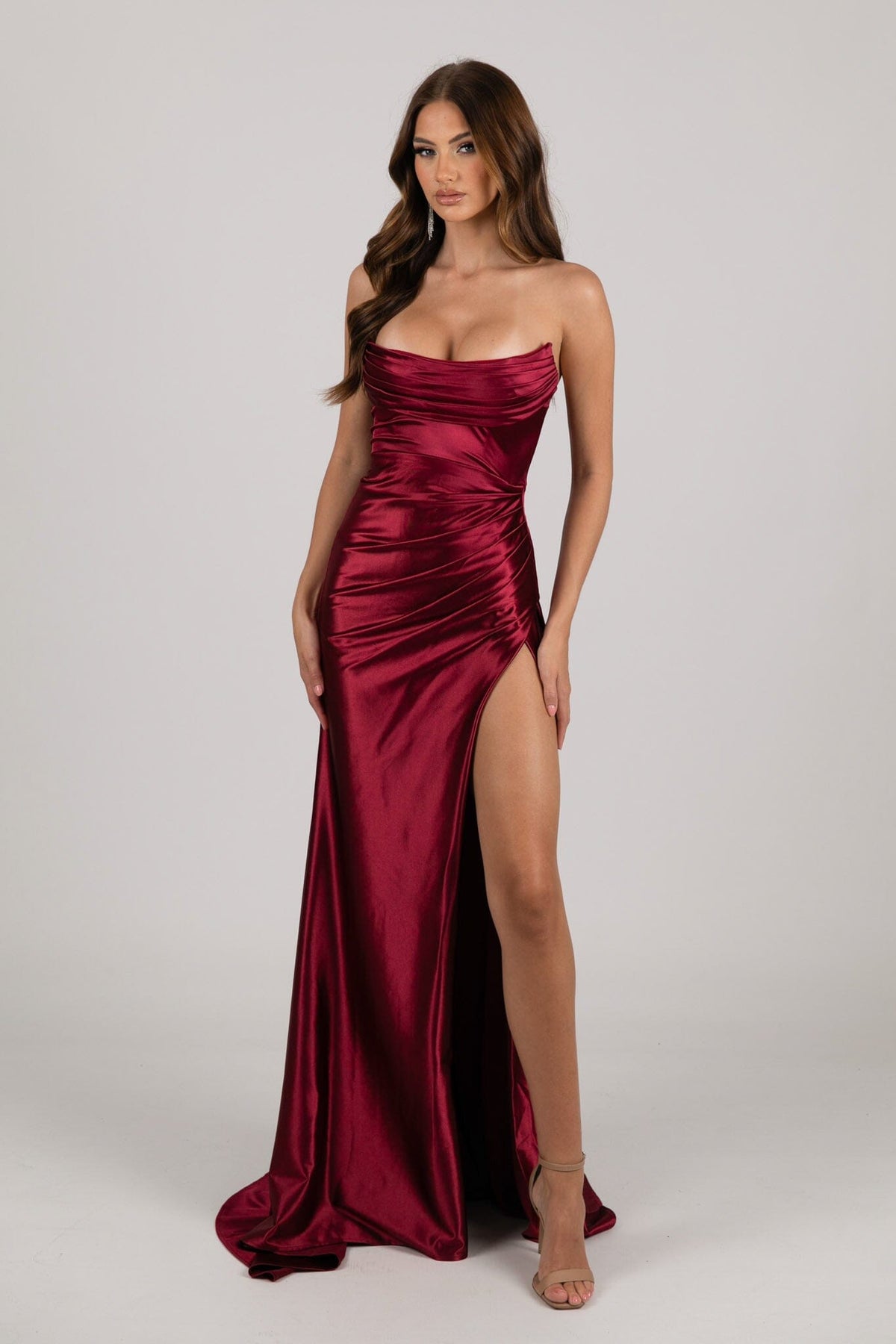 Burgundy Dark Red Stretch Satin Formal Gown with Bustier Strapless Neckline and Thigh High Side Slit