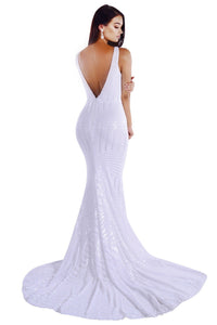 Back of White geometric sequin sleeveless evening gown featuring sweetheart neckline, shoulder straps, V open back and a very long train