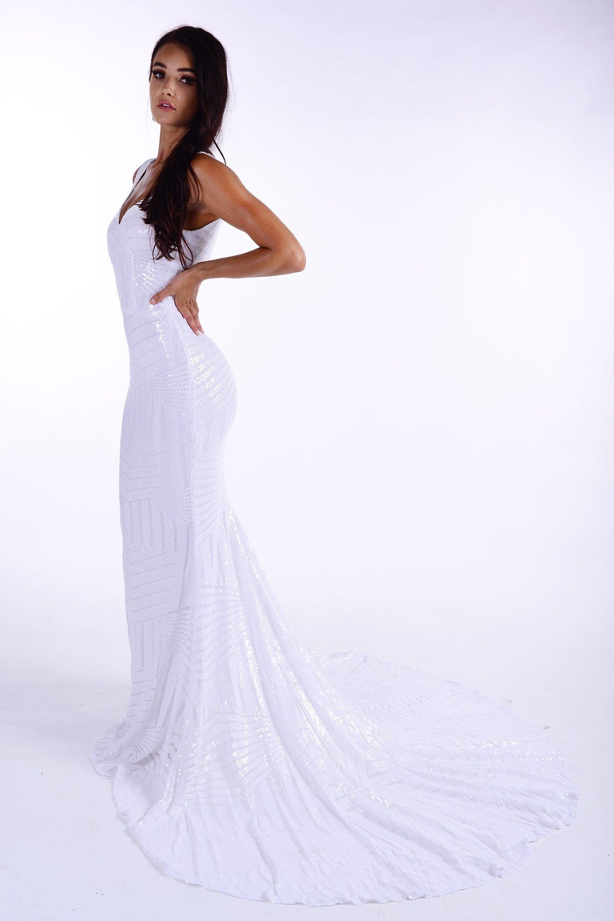 Side of White geometric sequin sleeveless evening gown featuring sweetheart neckline, shoulder straps, V open back and a very long train