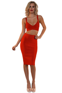 Front of red two-piece bandage dress including a bralette style top and a midi pencil skirt