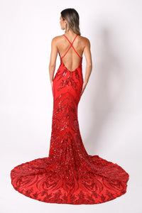Crisscross Straps on Open Back Design of Red Full Length Evening Sequin Gown with Deep Red Embroidered Pattern Sequins Over Red Underlay, V neckline, Thigh-high Side Slit, Fit and Flare Silhouette and Sweep Train