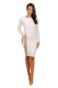 Front of long sleeve knee length form fitted bandage dress with side lace up design from waist to hem in white