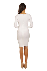 Back shot of long sleeve knee length form fitted bandage dress with side lace up design from waist to hem in white