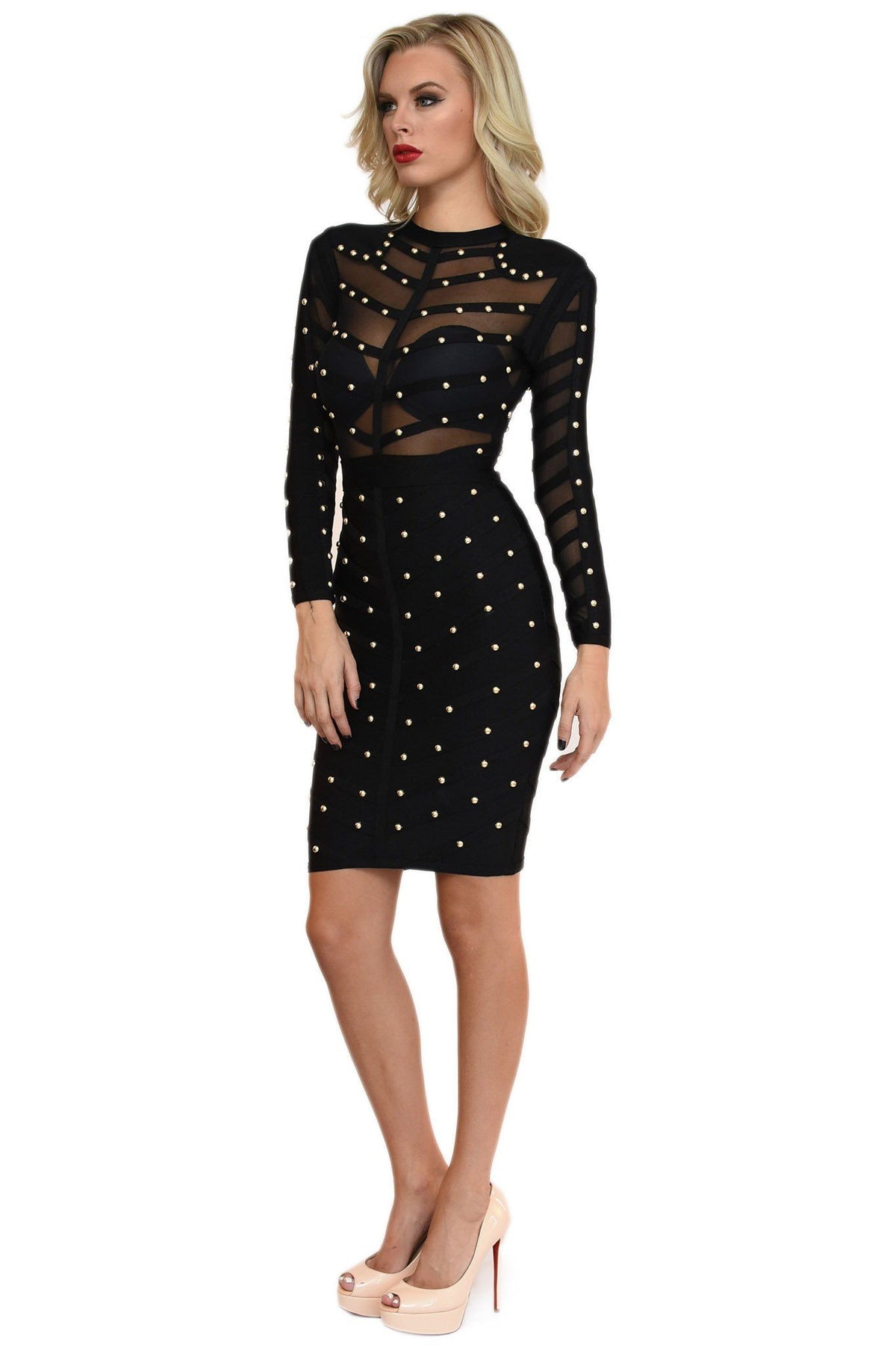 Side of black long sleeve midi bandage dress featuring gold beading details and sheer mesh