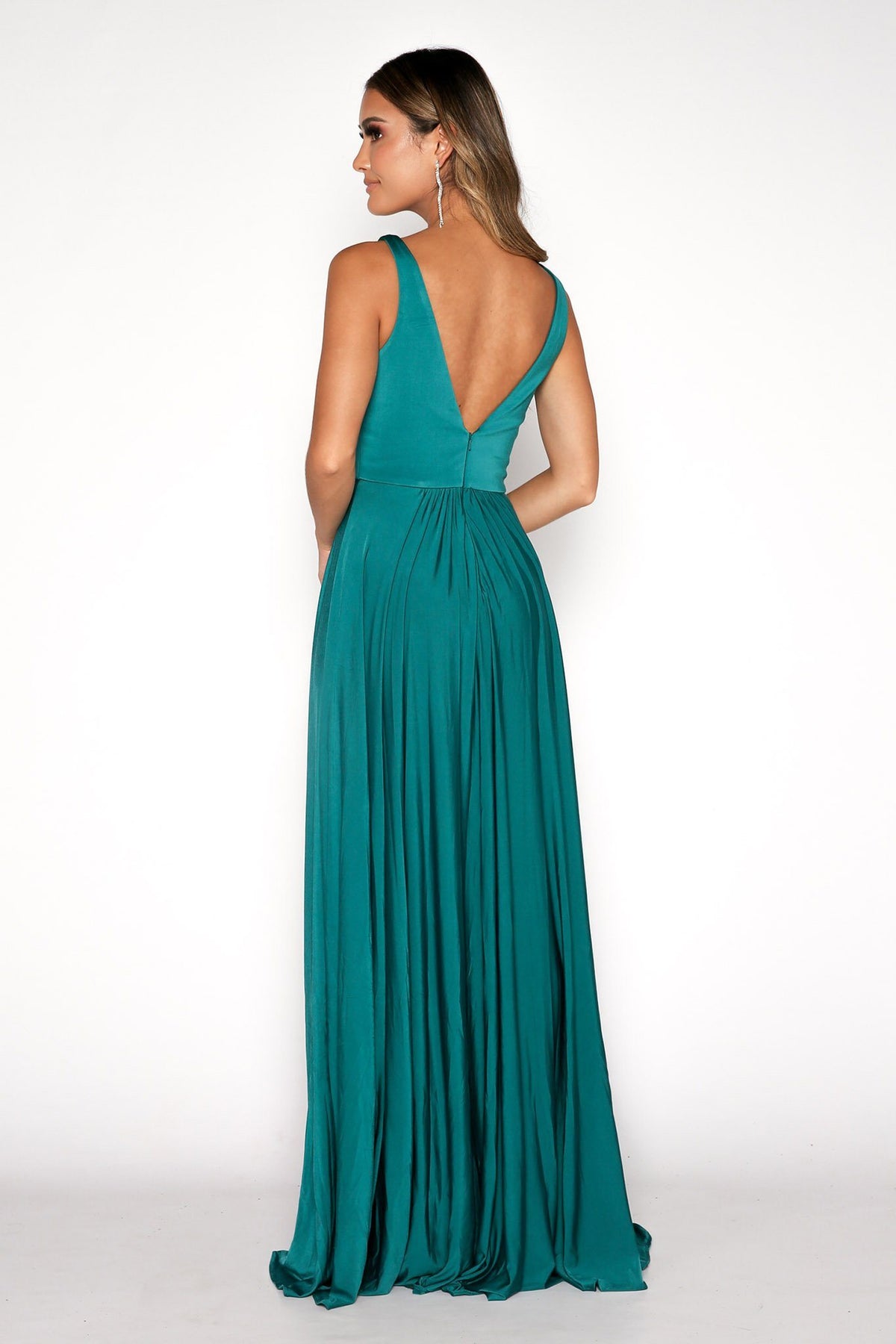 Open Back Design of Emerald Green Flowy Floor-Length A Line Maxi Dress featuring fitted V-Neckline Bodice, and Thigh-High Front Split