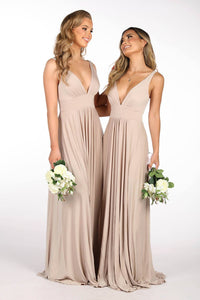 Floor-Length Bridesmaid Dress featuring slinky fabric in nude colour, fitted V-Neckline Bodice, A-Line Skirt and Thigh-High Front Split