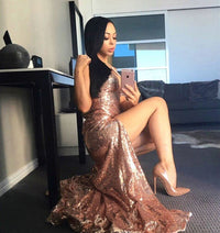 Fashion blogger Emilee Hembrow wearing Estellina Sequin Rose Gold gown by Noodz Boutique