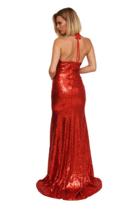 Back of red sparkly sequin floor length maxi sleeveless gown thin halter straps deep v neckline, high front leg split, long train