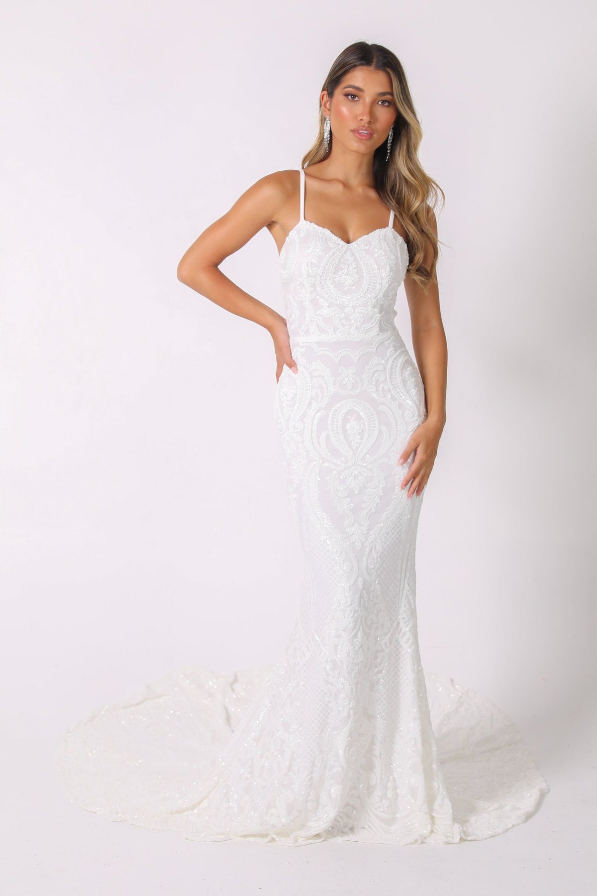 White embroidered pattern sequin gown with sweetheart neckline and thin shoulder straps