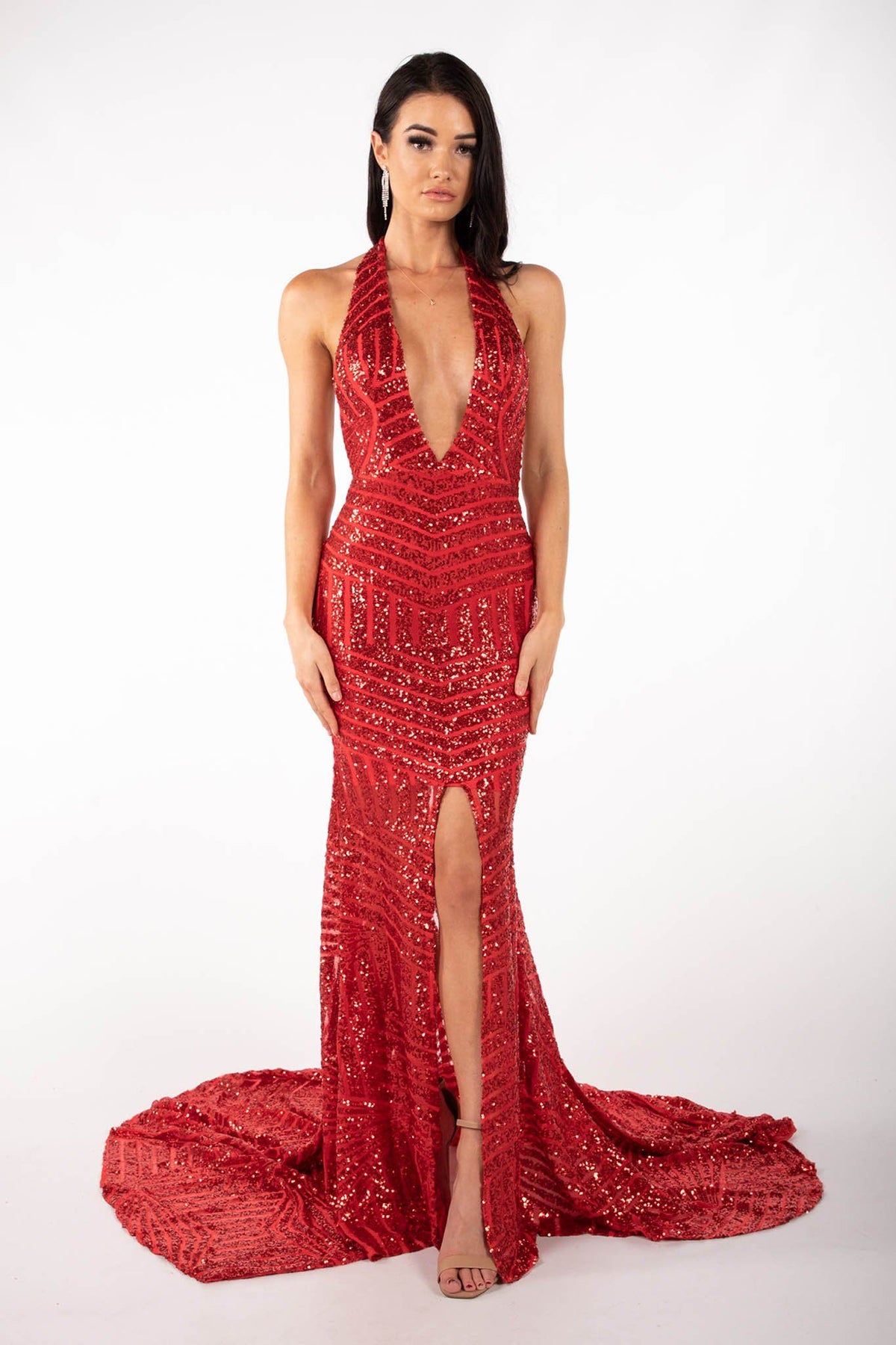 Red geometric sequin evening gown featuring halter V plunge neckline, high center front split, open back and sweep train