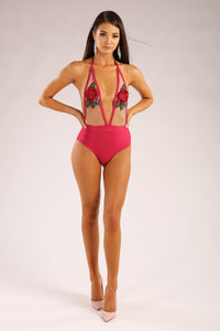 Pink bandage bodysuit or one piece swimsuit with floral details on sheer mesh top and high cut bandage bottom