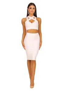 Two-piece bandage set in white color including a bandage crop top with peephole at bust and a midi length bandage pencil skirt