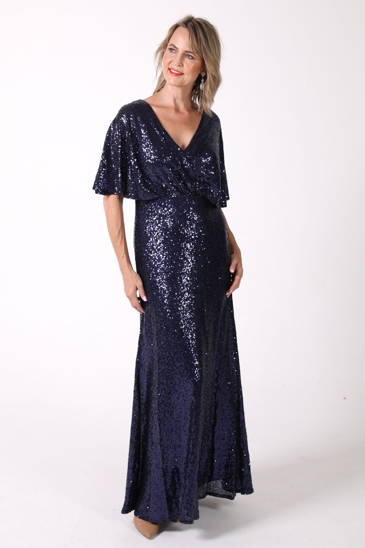 Mature woman sequin maxi dress with V neckline, butterfly sleeves in navy