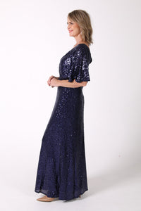 Side image of Mature woman sequin maxi dress with V neckline, butterfly sleeves in navy