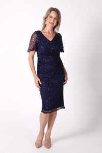 Mature woman sequin cocktail dress with V neckline and butterfly sleeves in navy color