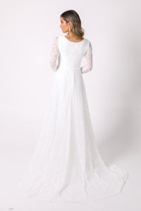 Closed Back Design of White Long Sleeve Lace Wedding Gown with V-Neck, Sheer Lace Fitted Sleeves, A-Line Skirt and Sweep Train