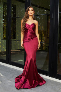 Style PS21279 Stretch Satin Gown in Burgundy by Designer Portia & Scarlett featuring strapless gathered bodice and figure hugging mermaid silhouette