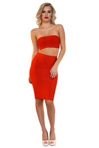 Front of two piece bandage set including a bandeau top and a midi pencil skirt