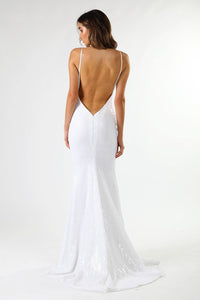 V Shaped Backless Design of Fitted White Sequin Formal Wedding Sleeveless Gown featuring Deep V Neck, Thin Shoulder Straps, and Long Train