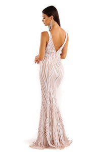 Back shot of white and beige sequin formal sleeveless gown with v plunge neckline and open back design