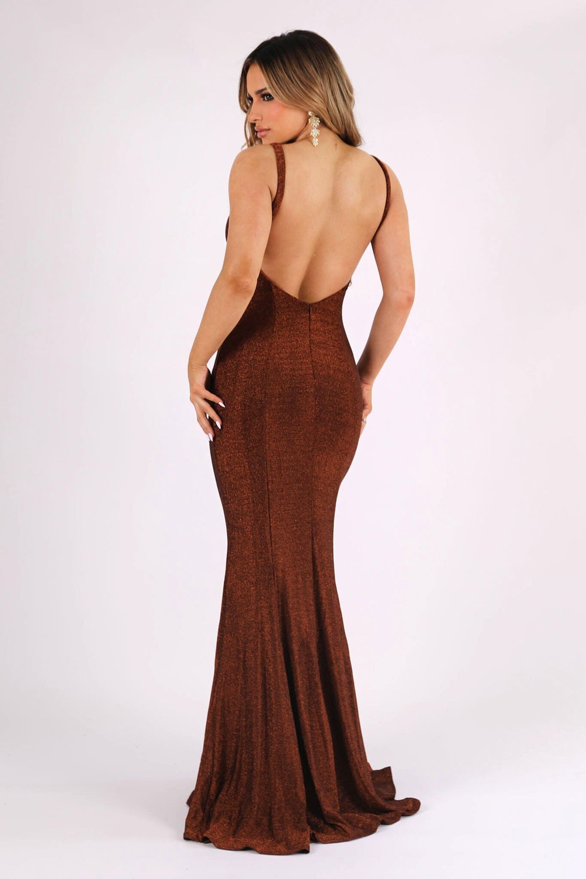 Backless Design of Shimmer Rust Brown Coloured Fitted Evening Gown with V Neckline
