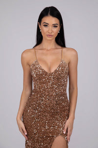 Close Up Image of Bronze Gold Colored Velvet Sequin Full Length Evening Gown with V Neckline, Thin Shoulder Straps, Thigh High Side Split and Lace Up Open Back