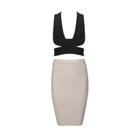 Front of black V plunging neckline bandage crop top with side cutouts and crisscross band design at the back paired with nude midi pencil skirt
